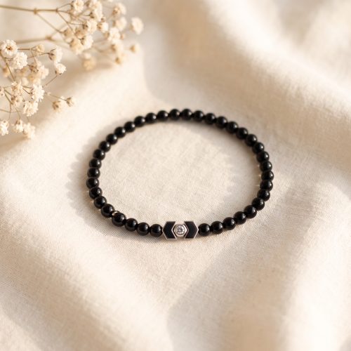 Zwarte herenarmband van natuursteen kraaltjes met zilverkleurig accent