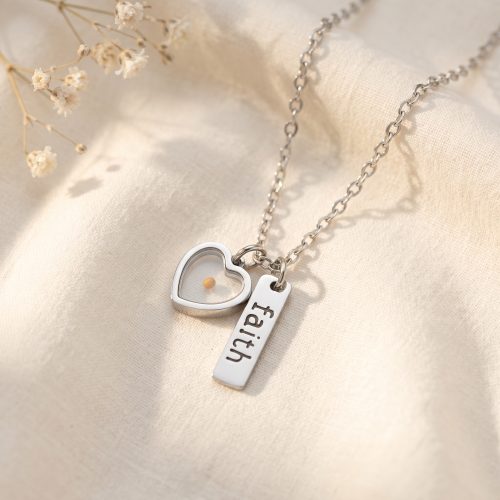 Zilveren ketting met mosterdzaadje-hartje en faith-bedel