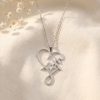 Zilveren ketting met open hart en het woord faith